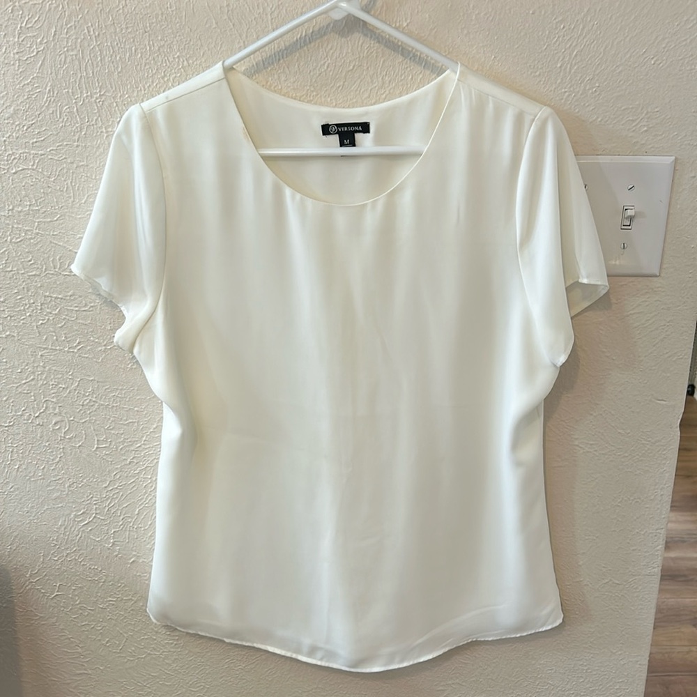 Cream colored women’s blouse